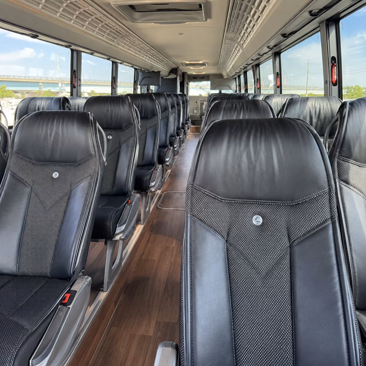 compare charter buses for cruise transfers to portmiami and port everglades